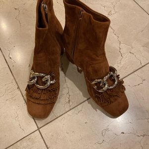 Miu Miu suede brown booties.